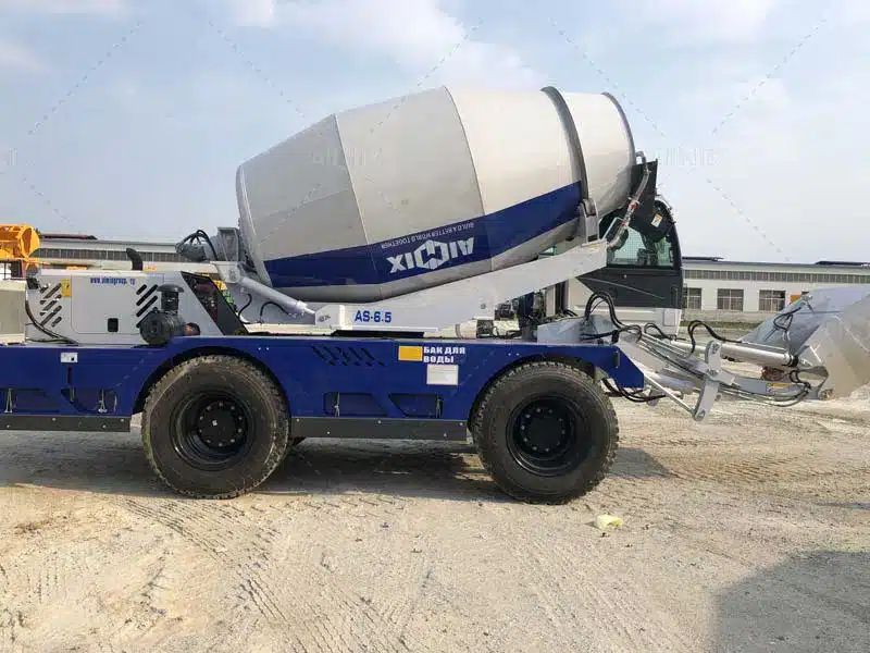 Self loading concrete transit mixer